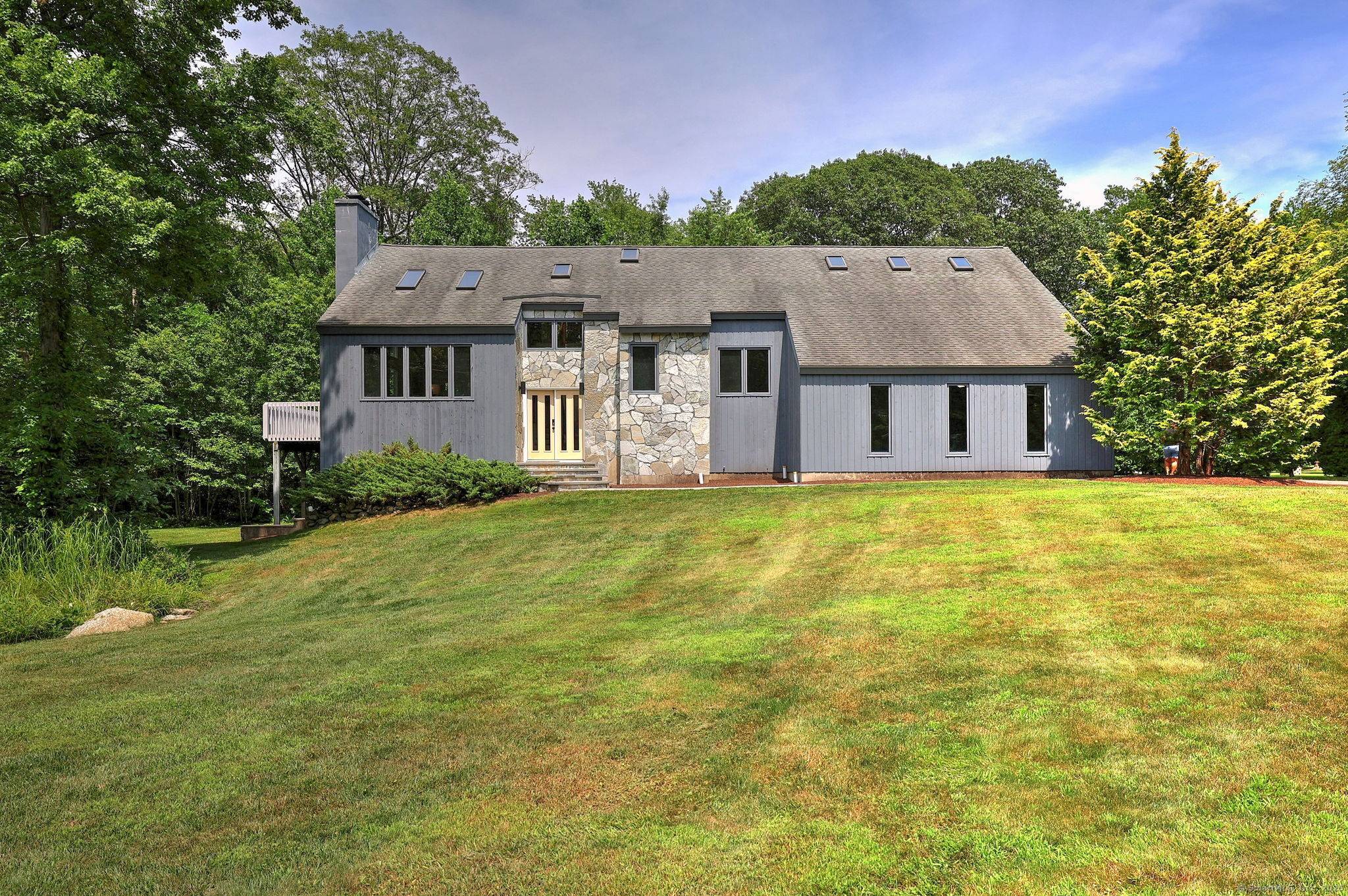 This stunning 3 bedroom, 3 full bath contemporary home has been completely remodelled and proudly showcases three levels of open, airy living space infused with natural light and nestled on ...