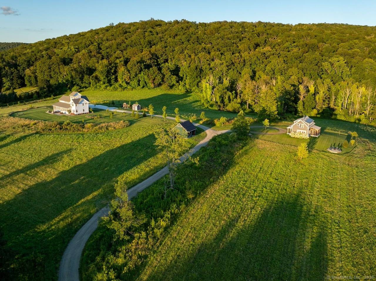 Sharon Home 2 BR Guest House on 60 Acres Set on 60 pristine acres in the Litchfield Hills, this 2020 modern masterpiece commands spectacular far reaching views across serene farmland ...