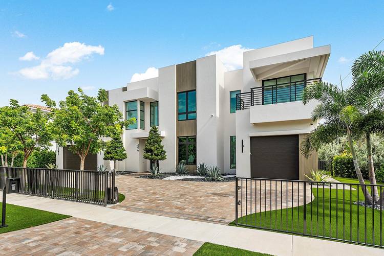 Built by Primo Luxury Homes, this exceptional Boca Villas residence is a striking blend of modern sophistication and coastal elegance.