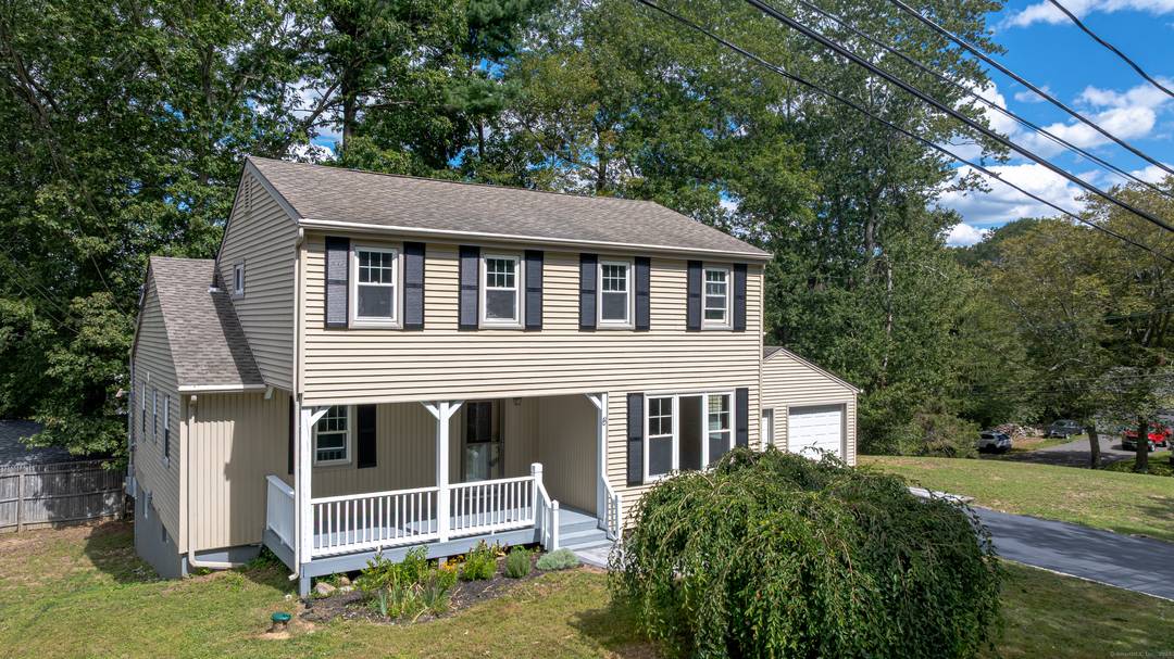 Welcome to this inviting 4 bedroom colonial on a cul de sac near the center of town of Wolcott.