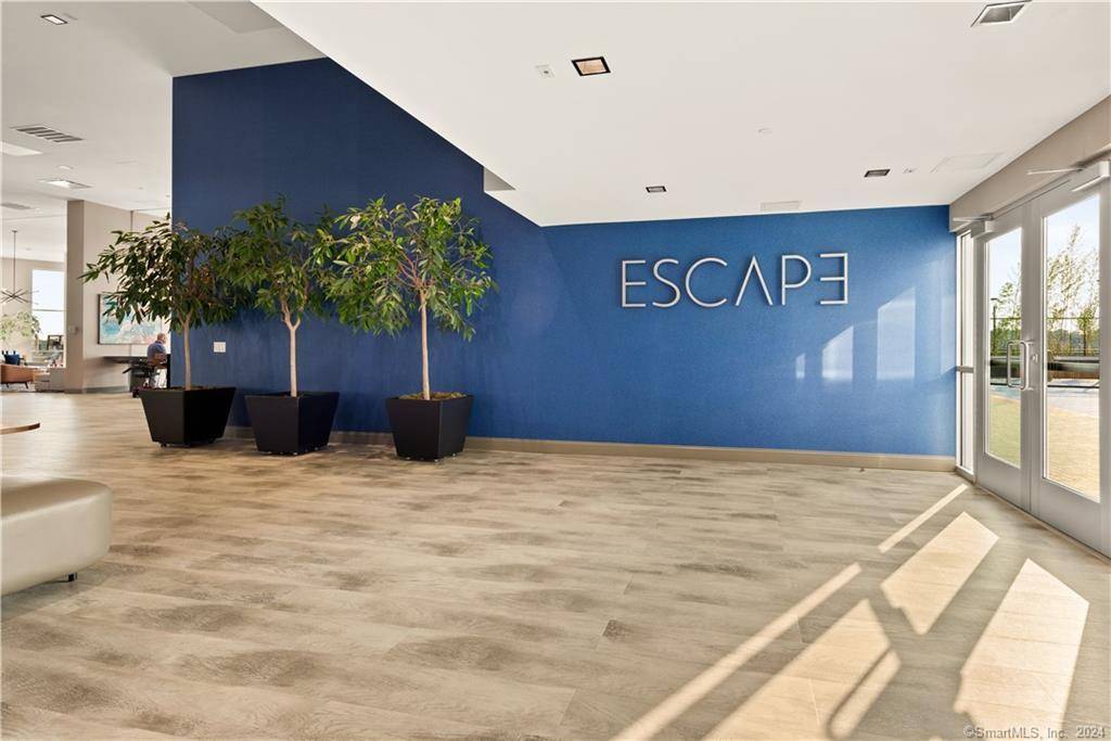 Escape to better at Harbor Point's newest luxury, waterfront residential building.