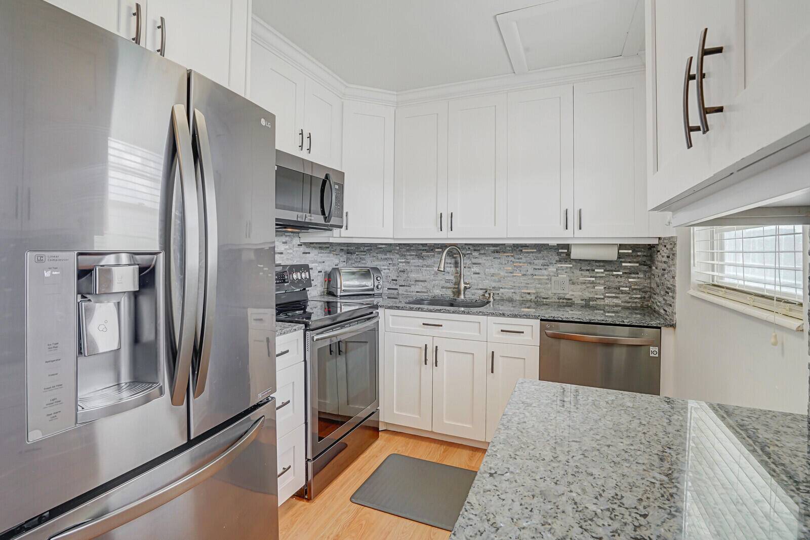 Meticulously maintained and spacious condo that exudes both comfort and style.