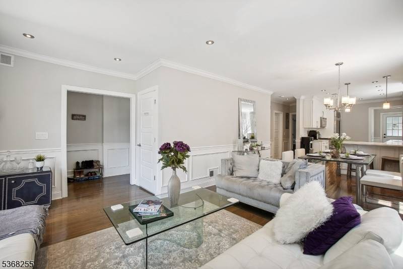 Bright and spacious is this spectacular first floor two story apartment with six rooms in the heart of Montclair, only steps from the NYC train.