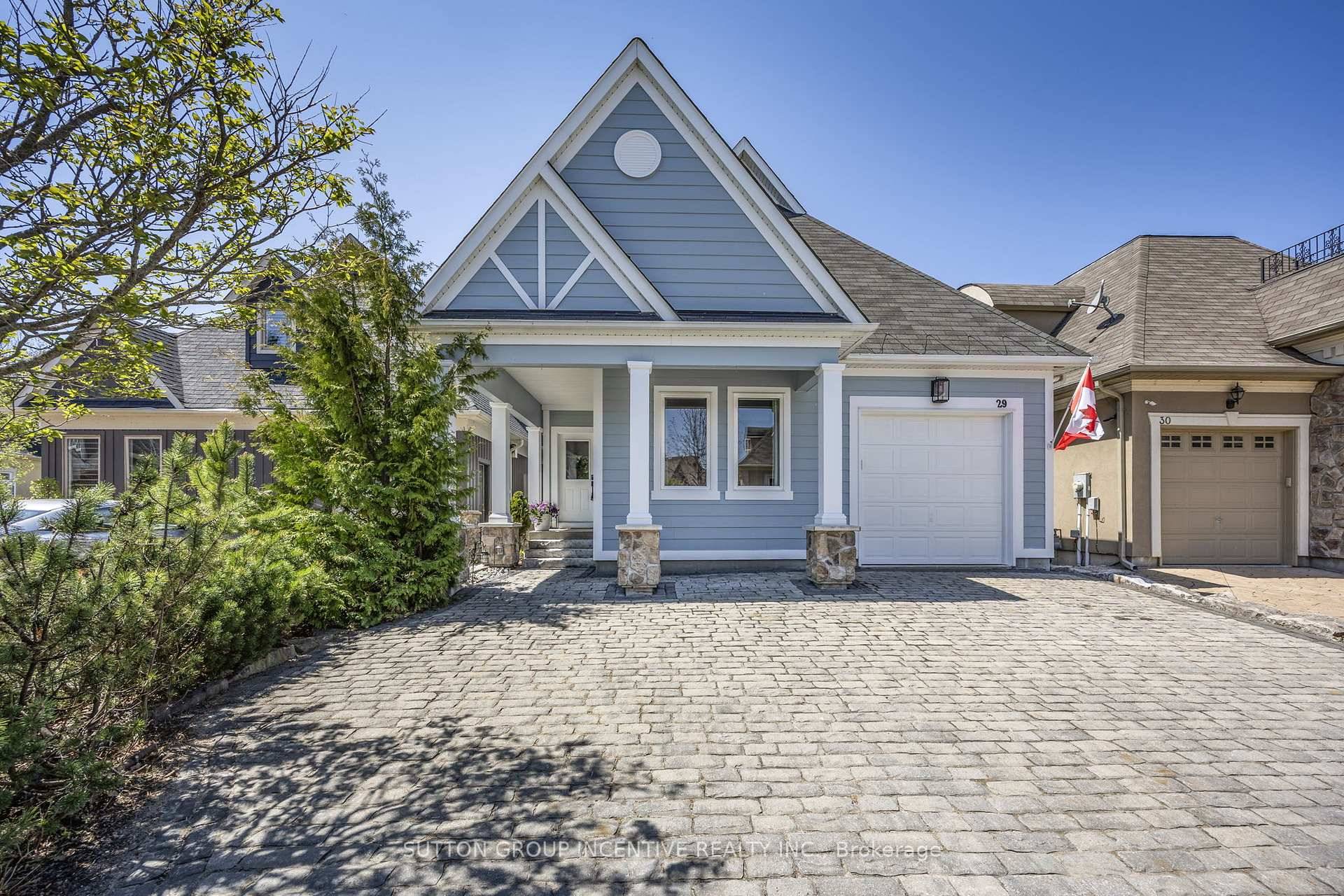 Welcome to a rare offering in the exclusive, gated community of Sophies Landing, where luxury meets lakeside living.
