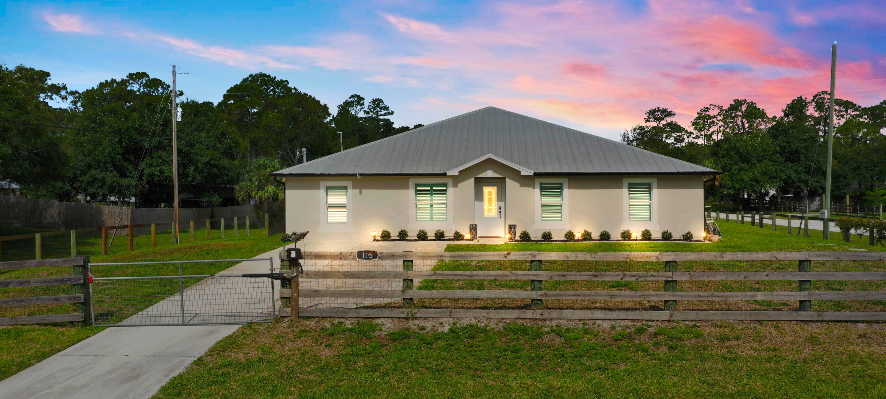 Beautifully updated 5BR office home on a fully fenced 0.
