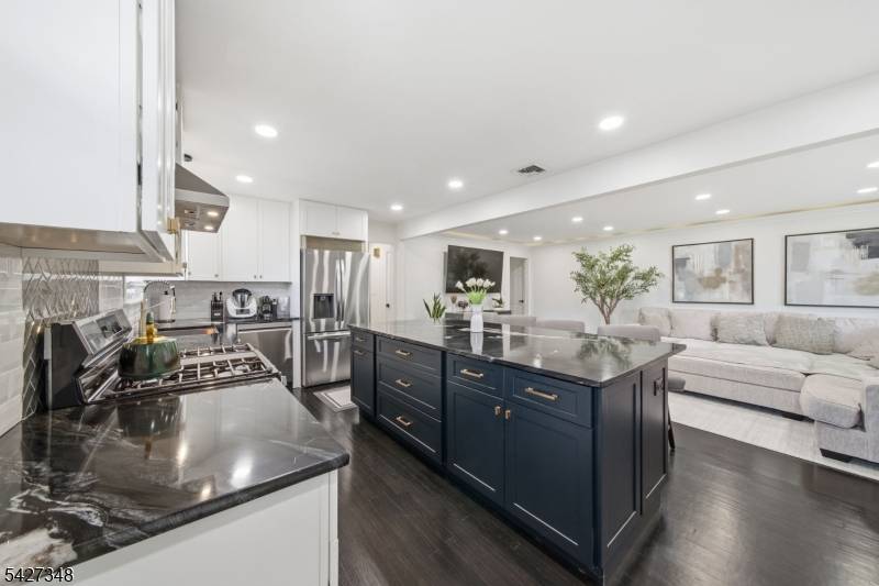 AMAZING renovated 2025 modern style ranch is ideally situated on private end street location.