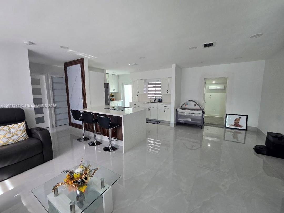 Beautifully remodeled 4 bedroom 2 bath single family home featuring a spacious backyard perfect for quality family gatherings and entertaining.