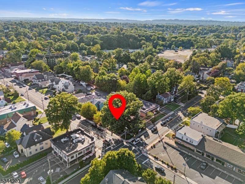 Opportunity for investor or business owner looking for a mixed use property on a corner lot in the downtown area of Nutley.