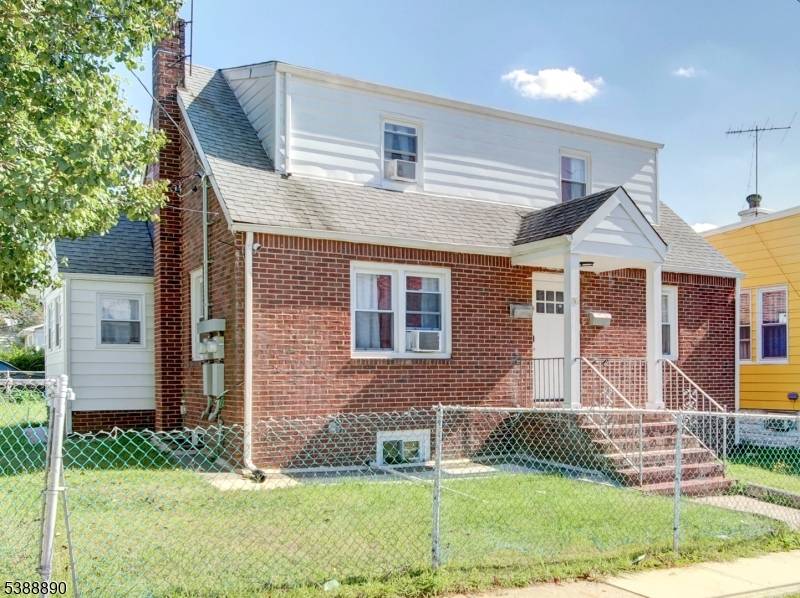 WELCOME TO 36 ORCHARD PLACE, A CORNER LOT TWO FAMILY HOME THAT BLENDS MODERN UPDATES WITH INCOME POTENTIAL.