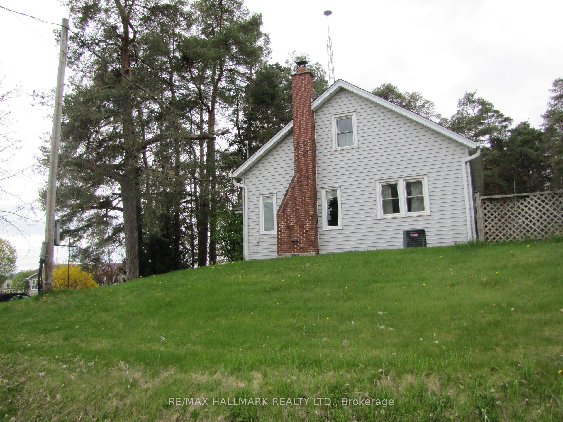 1. 2 acres Treed land. Close Proximity To Gas Station, Shops And Other Amenities with main street exposure.