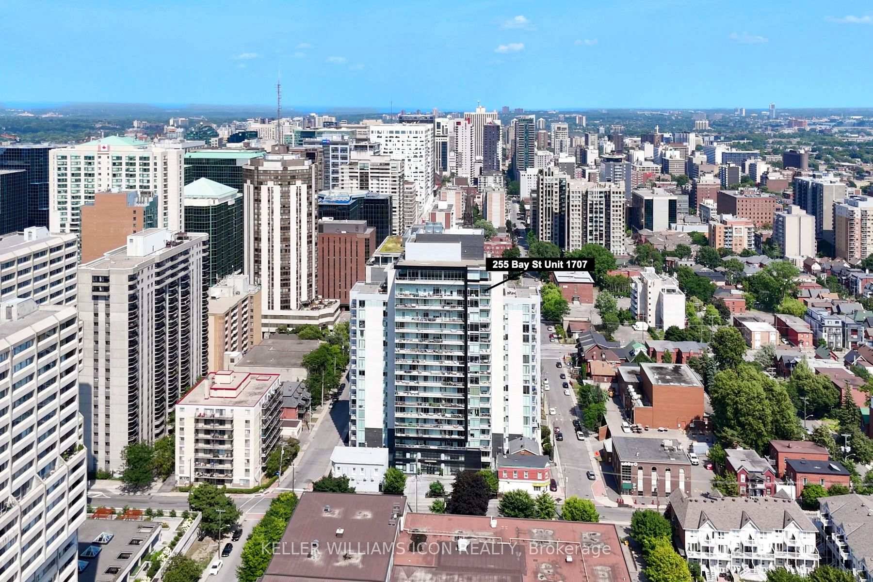 Penthouse Level Corner Unit with Panoramic Views of the city's skyline.