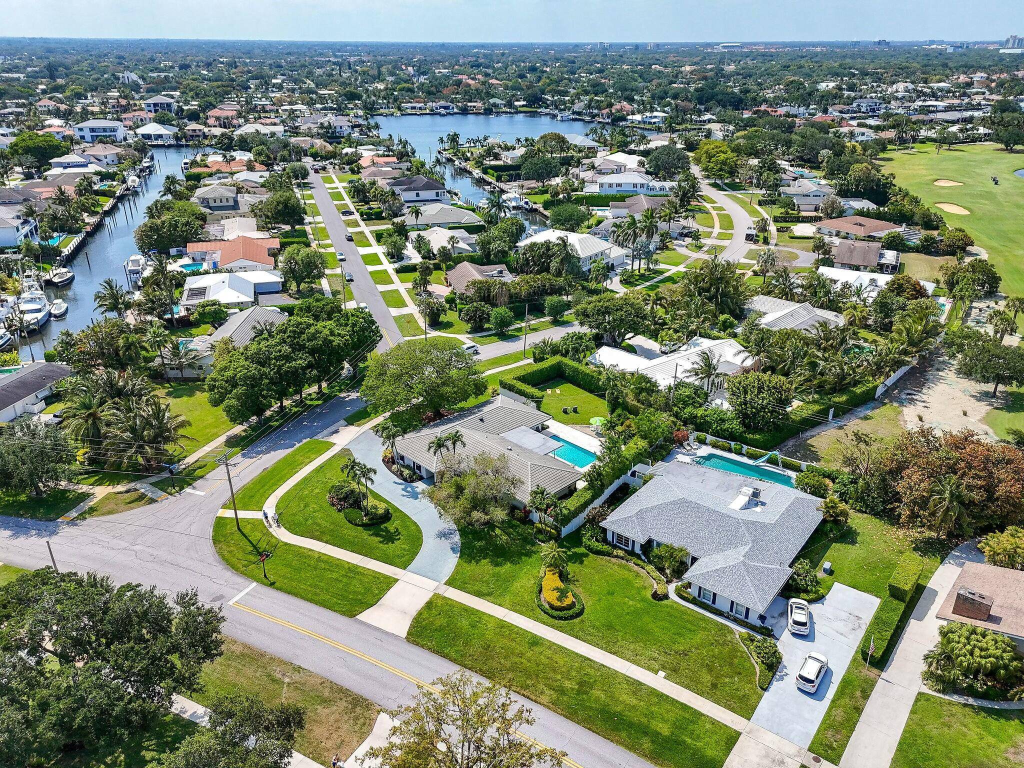 Enjoy Country Club Living with No HOA on a prime 1 2 acre, corner lot in the Village of North Palm Beach This expanded 3 bedroom, 3 bath home also ...
