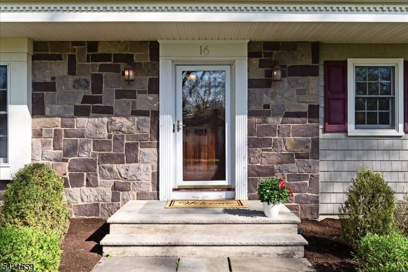 Welcome to the exquisite 16 Crestview Terrace, a charming residence nestled in the highly sought after Convent Station neighborhood of Morris Township.