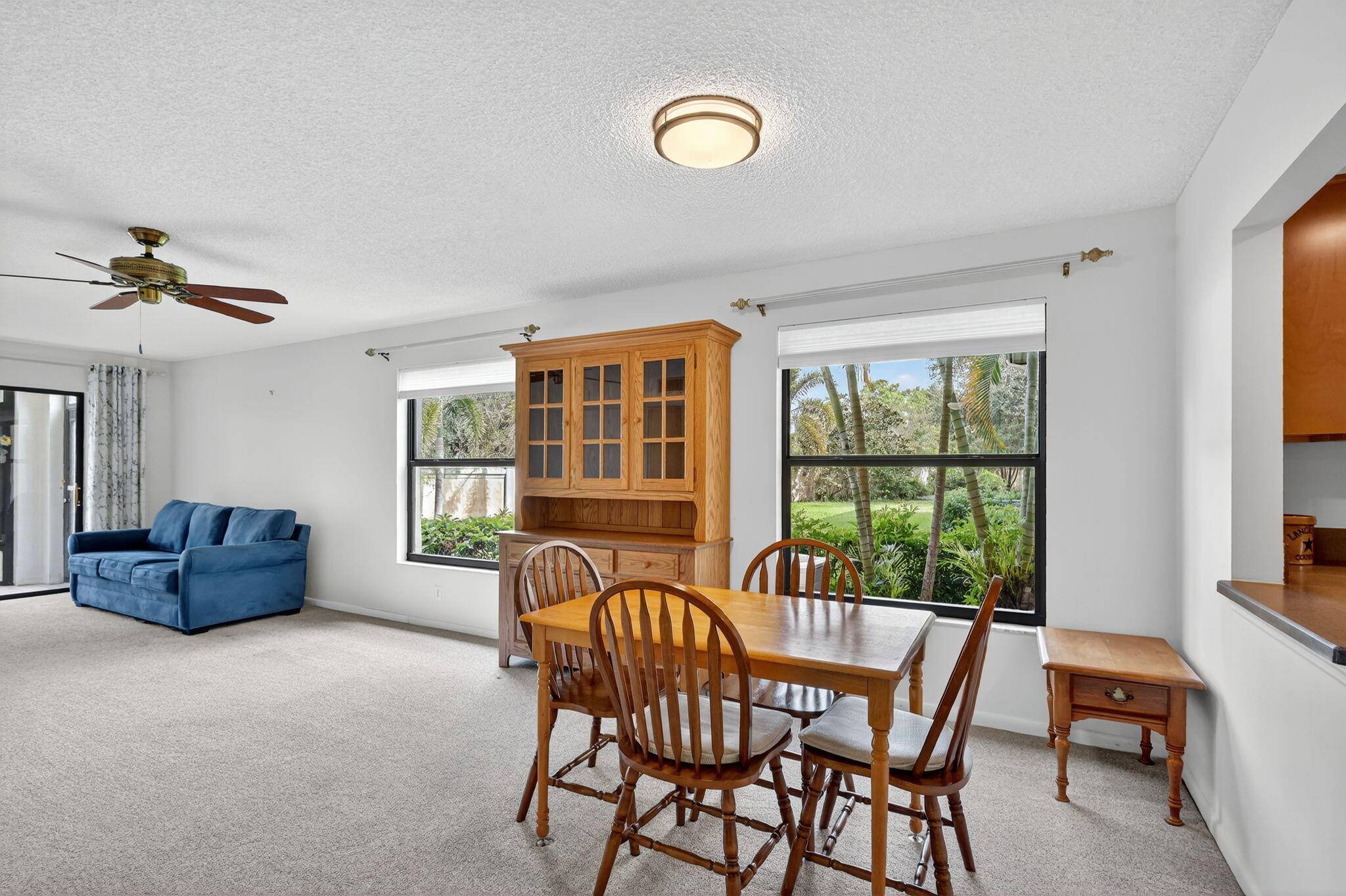 Beautiful FIRST floor 2 bedroom, 2 bath condo located in the active 55 community of South River Village in Stuart is a MUST SEE !