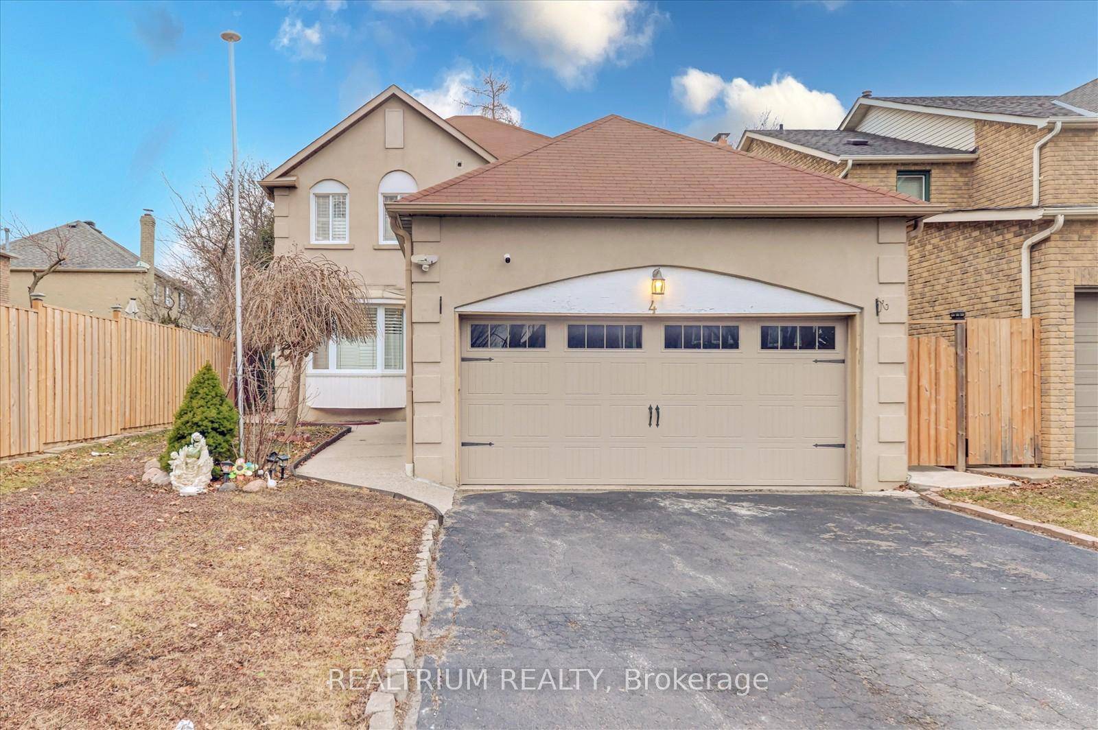 This stunning home features a separate entrance to a finished basement, offering excellent potential for extended family living or rental income.
