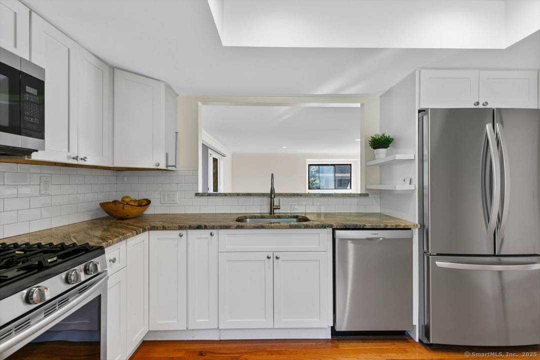 WOW ! This AMAZING remodeled 2 bedroom ranch condo is perfect for anyone looking for easy living complete with a chair lift for added convenience.