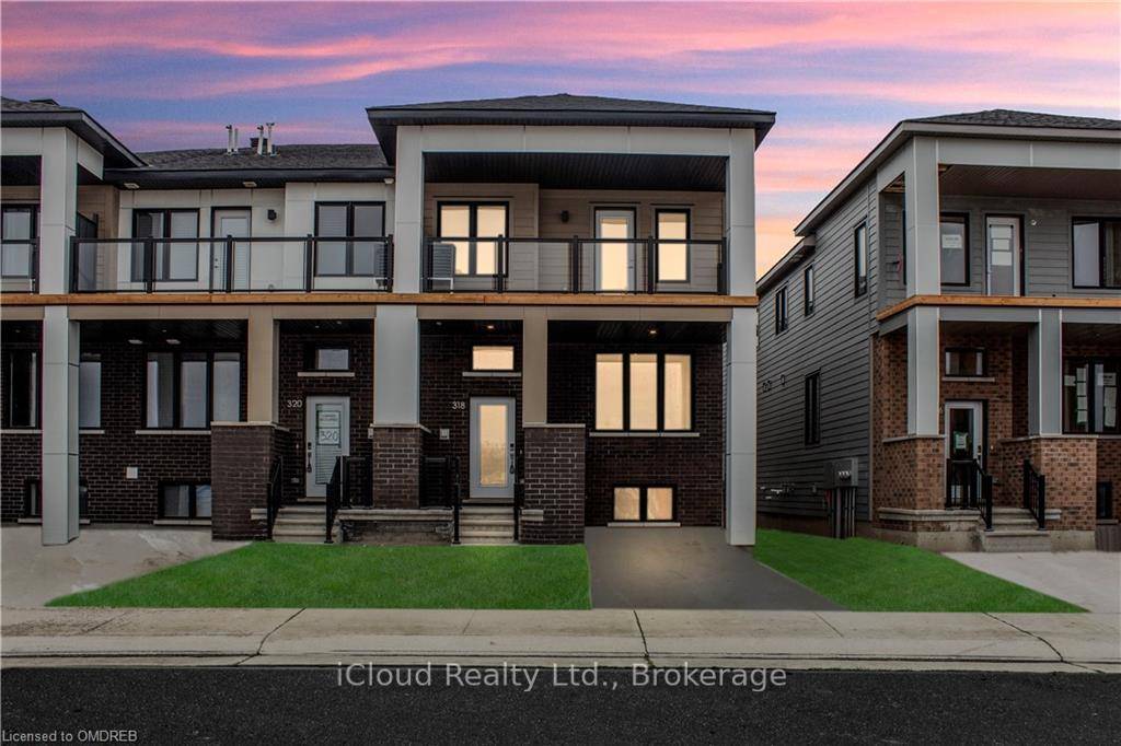 This beautiful 2 story end unit townhouse with over 1600 sq ft including basement features an open plan dining and kitchen area at it centre.