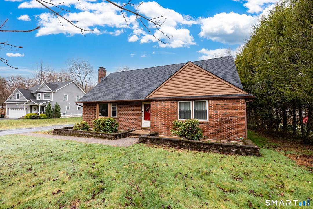 Don't miss this 4 bedroom, 2 bath midcentury modern classic home on over half an acre in desirable Southington.