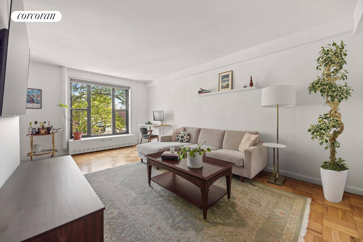 This extra large, renovated home has two exposures with over sized windows framing treetop views of historic Clinton Hill, Brooklyn.