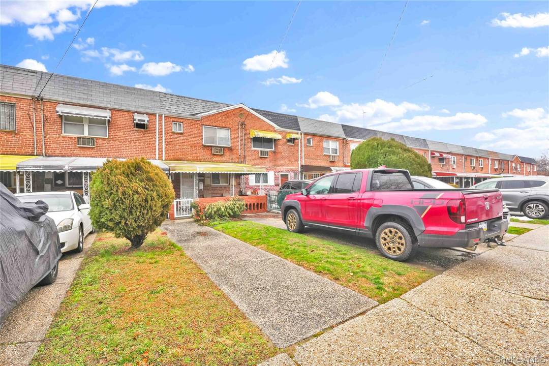 Welcome to 989 Schenck Avenue, a well maintained brick single family home offering comfortable and flexible living space across three levels.