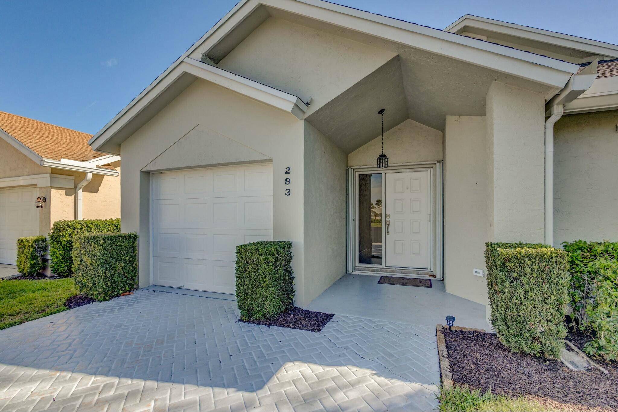 This Newly Updated 3BR 2BA Home Rests in the Highly Desirable Community of Eagle Ridge and Boasts New Roof, Impact Windows, New AC, New Floors, New HWH and More !