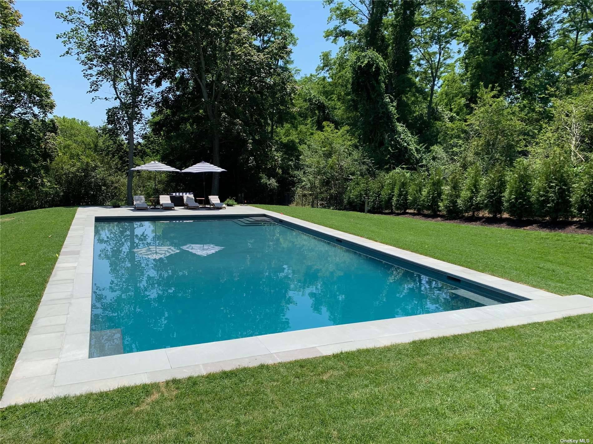 Amazing North Fork home with heated salt water gunite pool located in Grandview Estates featuring 4 bedrooms 1st floor bedroom with ensuite, 2 ensuite guest bedroom on the second floor ...