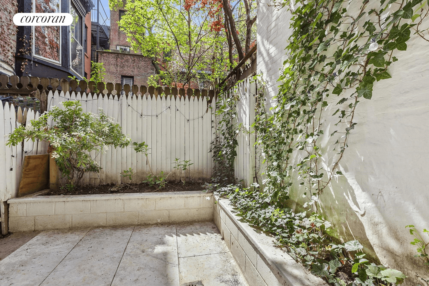 This charming one bedroom has its own private garden located between idyllic Perry Street and West 4th St.