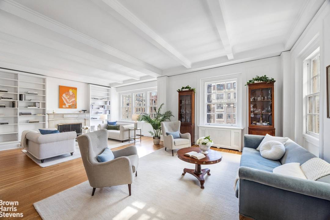 High above Park Avenue, featuring soaring ceilings, views of the tree lined avenue and the iconic Carlyle Hotel through expansive living room windows, and offering three bedrooms flex four, a ...