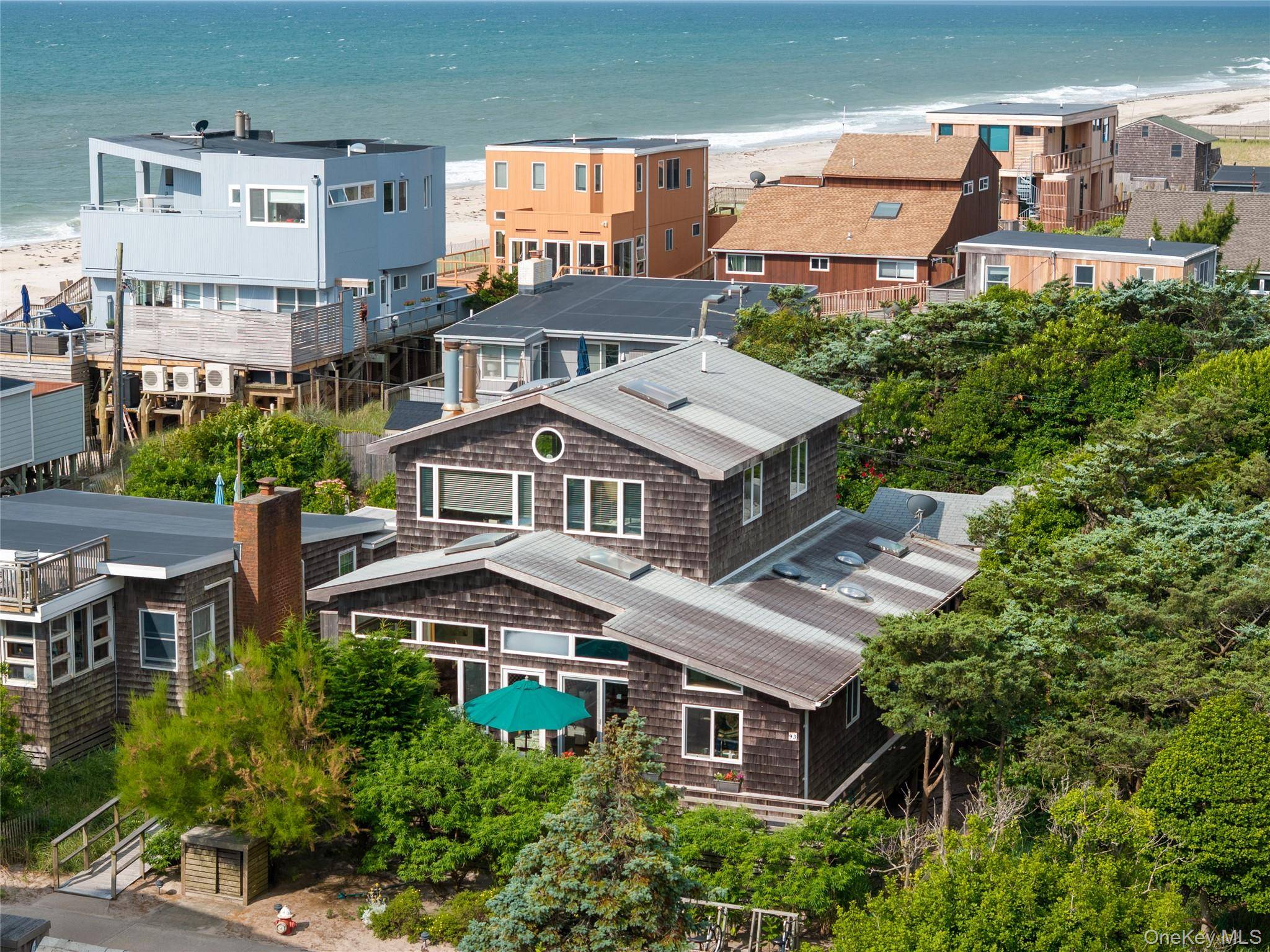 Ideally located just 100 feet from the beach, this spacious, well maintained 4 bedroom home will check every box on your list !