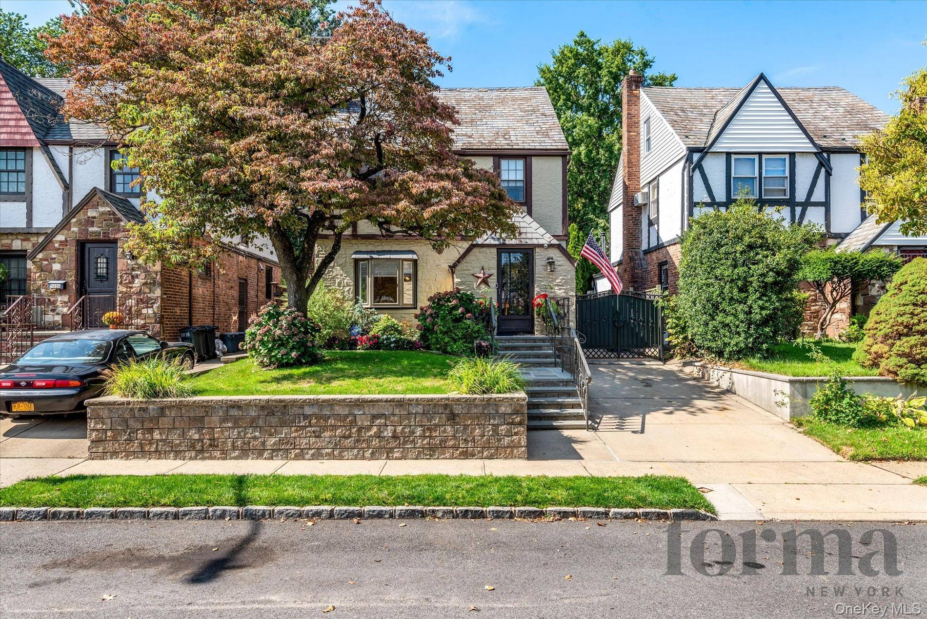 This beautifully maintained single family tudor home Douglaston Little Neck area.
