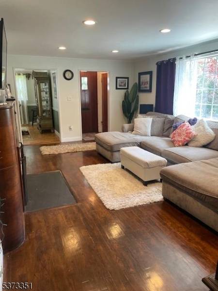 Charming Raised Ranch on a tree lined Cul De Sac.