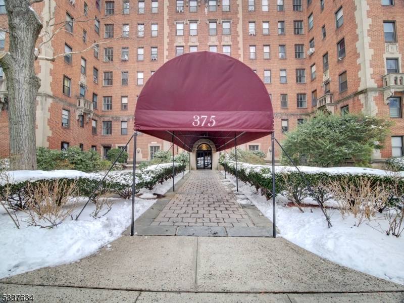 Come home to the timeless elegance in this exquisite two bedroom, two bath condo, located in the Mount Prospect Manor a historic pre war building renowned for its stunning architecture.