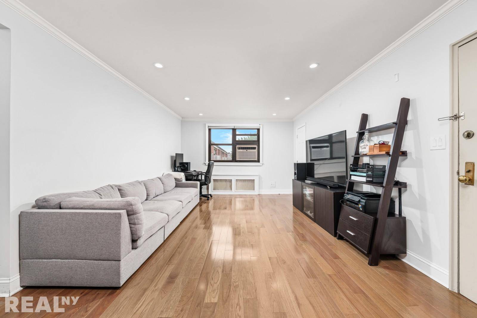 Welcome to this fully gut renovated upper floor 2 bedroom, 1 bathroom co op apartment, ideally nestled in a charming garden front courtyard building.