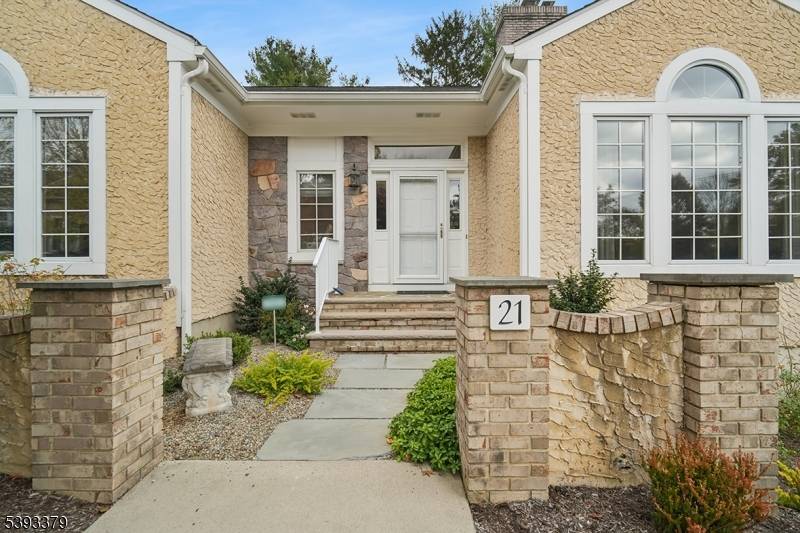 Exceptionally spacious townhome with rare to find first floor primary suite.