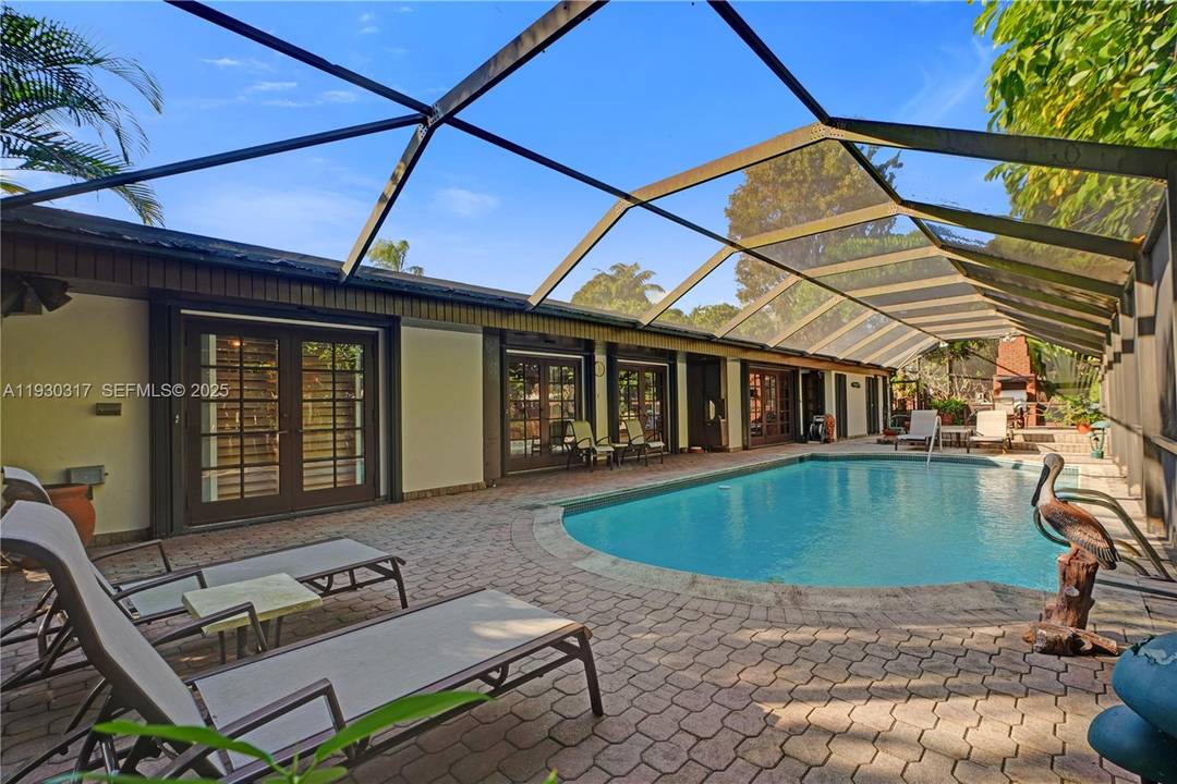 If location and lifestyle matter, this distinguished Kendallwood residence truly stands apart.