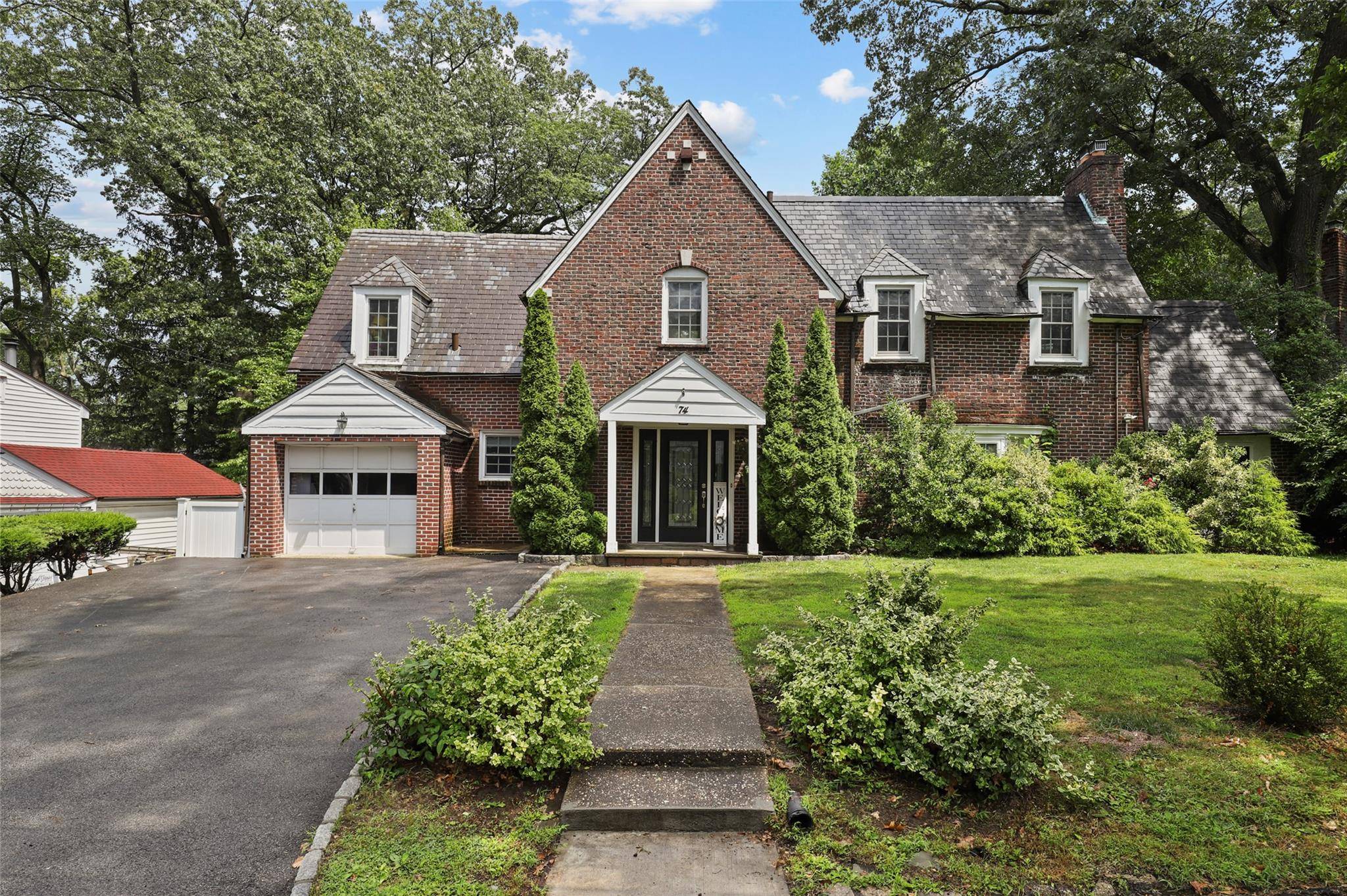 Timeless Tudor Charm in Colonial Heights Welcome to 74 also known as 84 Chester Drive, a stunning 1928 Tudor style home located in the heart of Yonkers desirable Colonial Heights ...