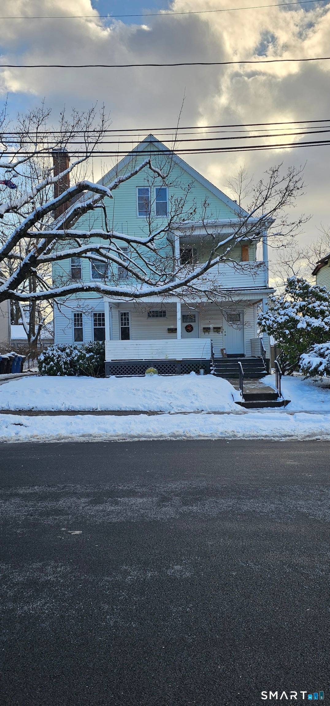 Well maintained three family home ideally located near Martha Hart Park.