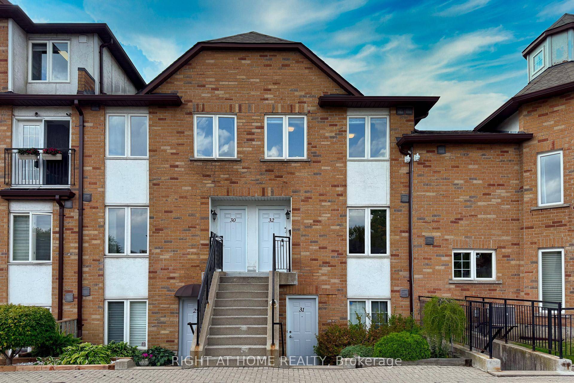 Location ! Well Maintained 3 Br Townhouse on a Private Dead End Street, Laminate Floors Throughout, Kitchen Quarts Counters, Under Mount Double Sink, SS Appliances, Glass Tile Backsplash !