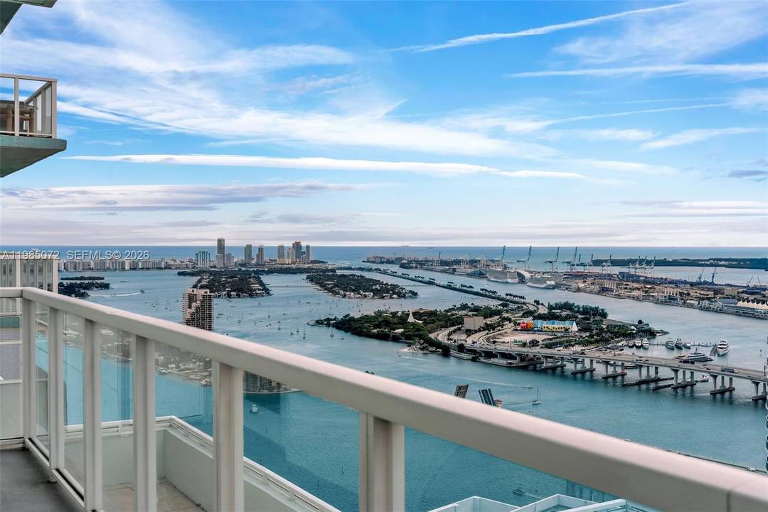 Soak in sunrise and sunset views from this 50th floor corner Penthouse right on the water with over 1, 900sqft of living space.