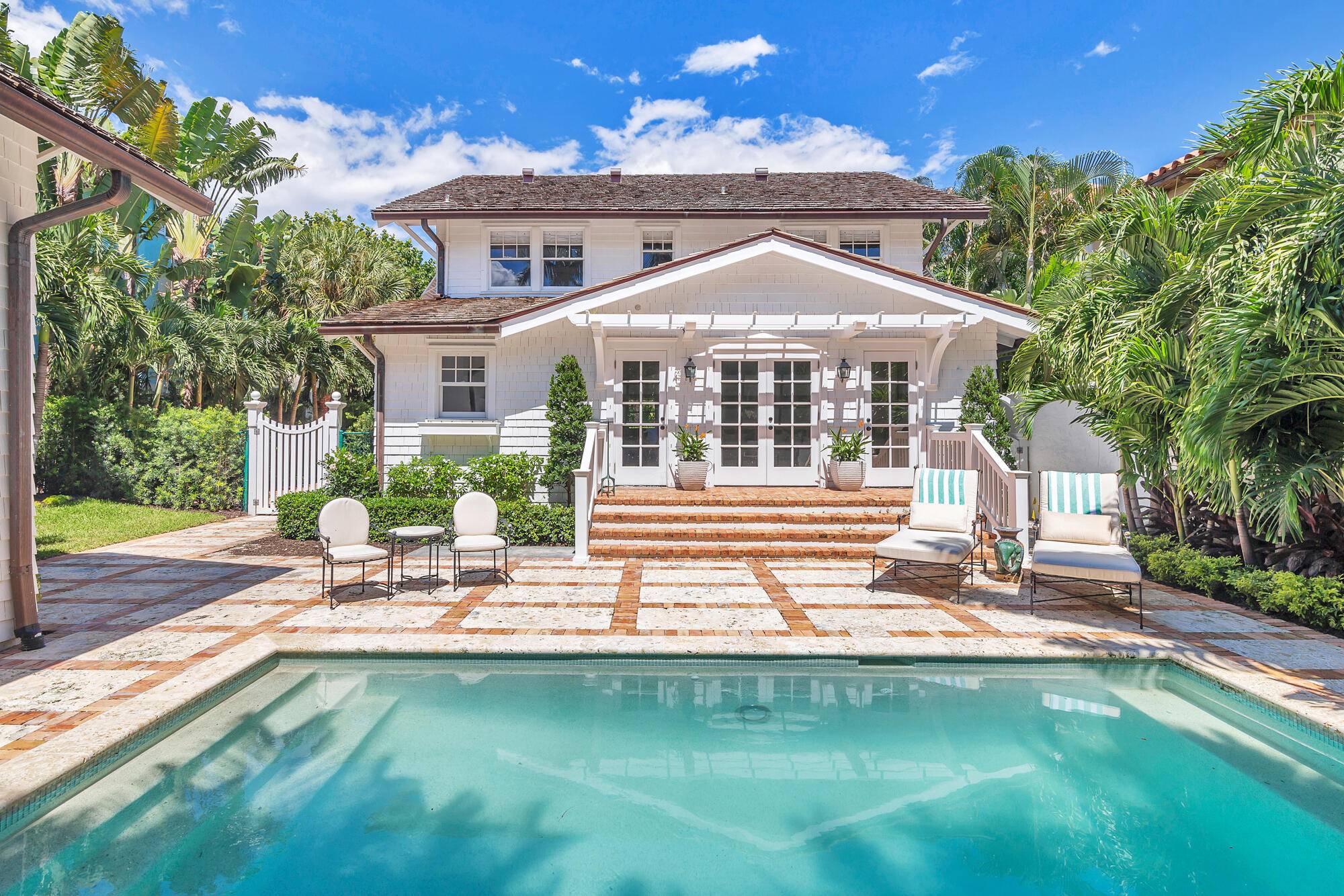 Located on a coveted ''sea'' street and just moments from the beach, this renovated bungalow style cottage is a timeless Palm Beach residence.