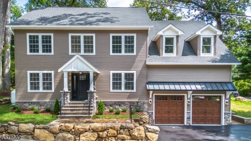 Nestled in sought after Cedar Lake, this stunning 5 bedroom, 3.