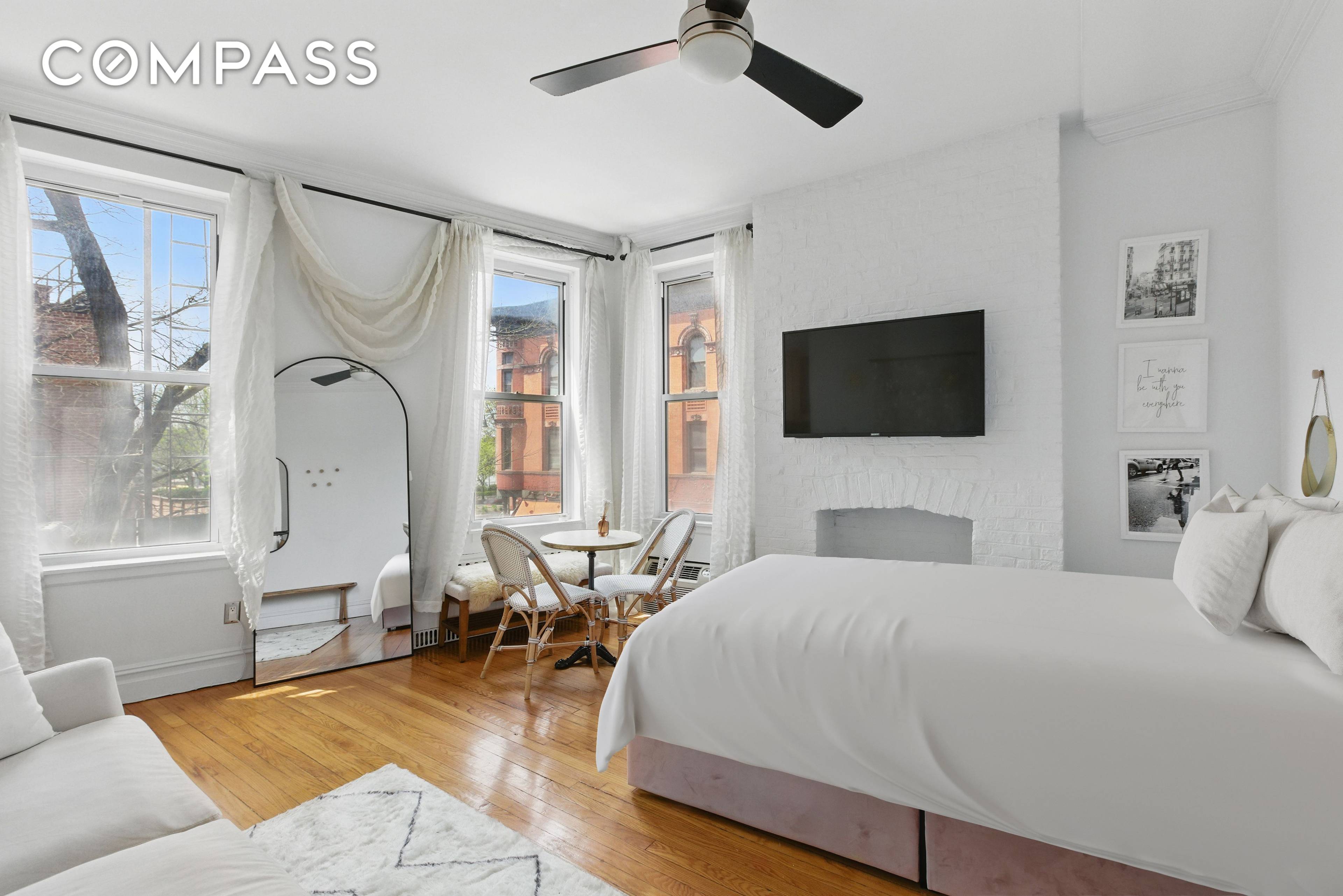 Chic Corner Studio with Stunning Hudson River Park Views On One of the Best Blocks in the West Village Offered Furnished or Unfurnished !