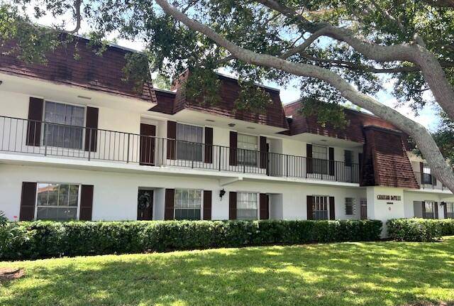 Best Buy... Age 55 first floor, 2 bedroom, 2 bath condo in Meridian Park that backs to a small canal.