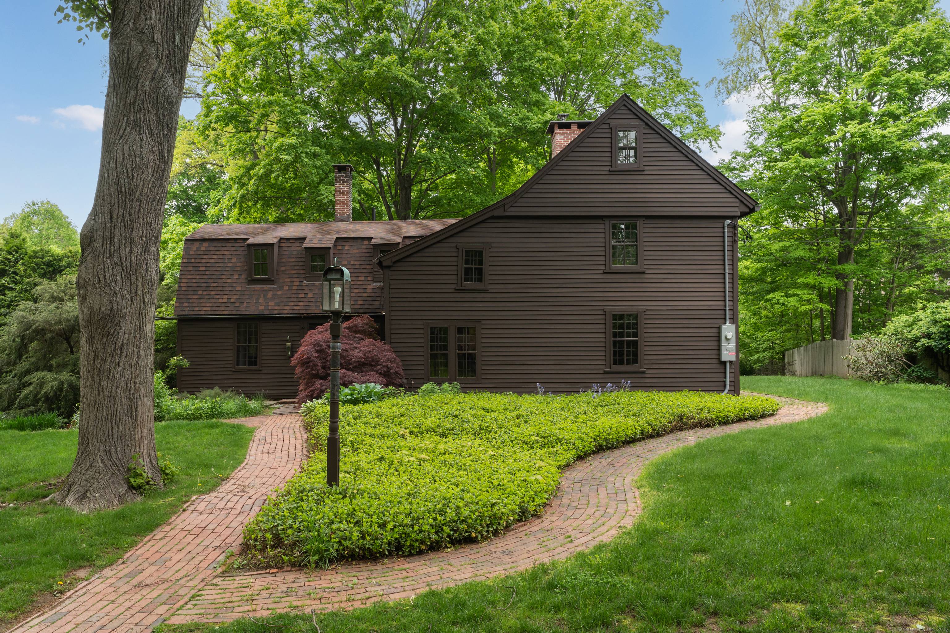 There is room to spare in this wonderful 10 room historic saltbox home that sits on 3.