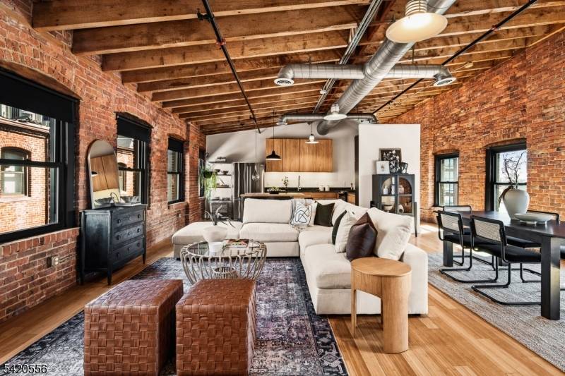 A one of a kind top floor loft at the iconic Button Factory offering soaring cathedral ceilings, dramatic open space, and the kind of authentic industrial character that is rarely ...