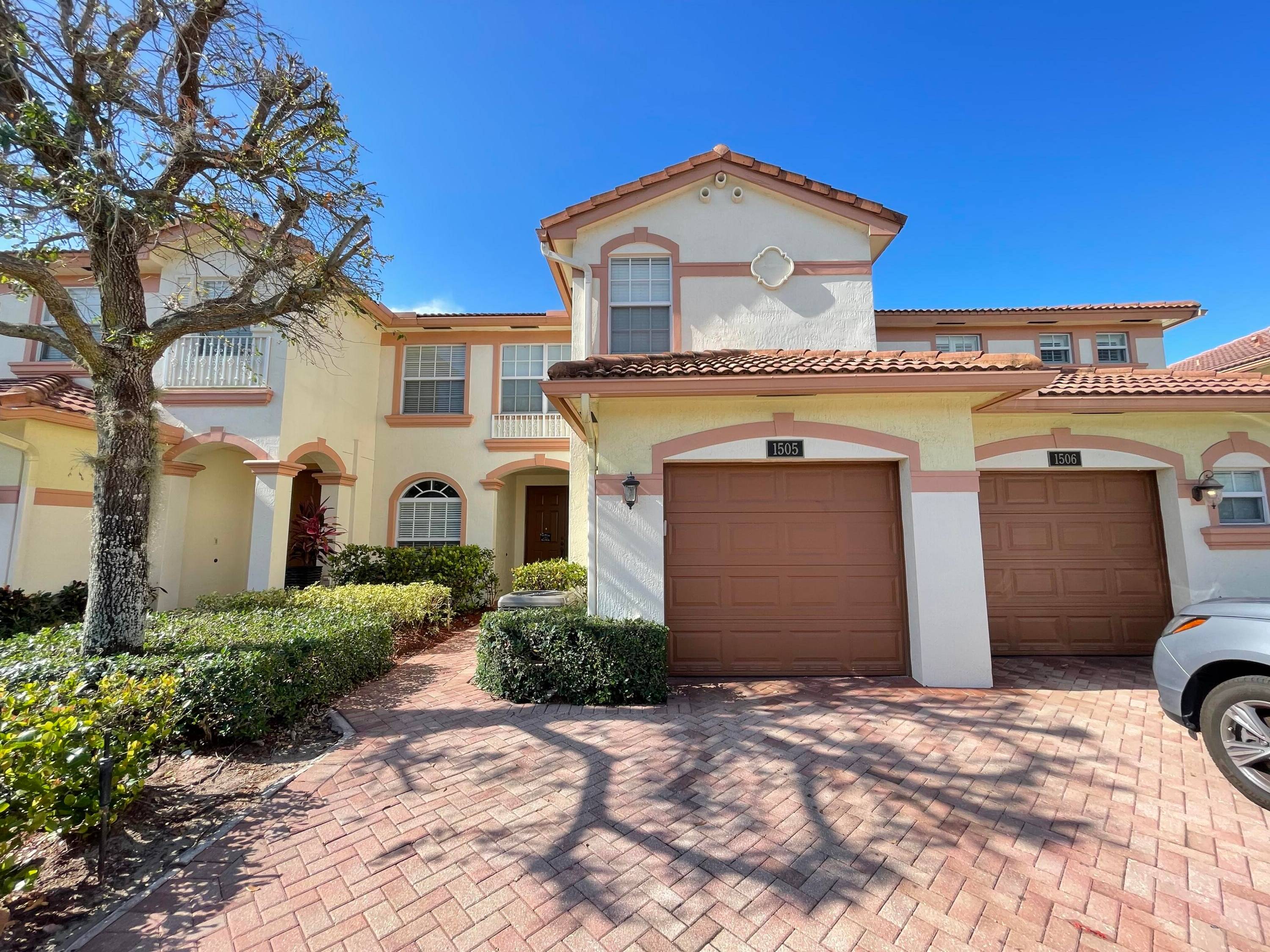 This is a beautiful townhome w open pavered patio overlooking private, tranquil garden view.