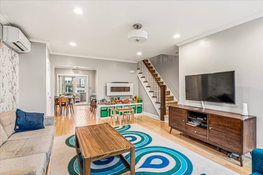 This charming townhouse offers an ideal residential setting with three bedrooms and two and a half bathrooms.