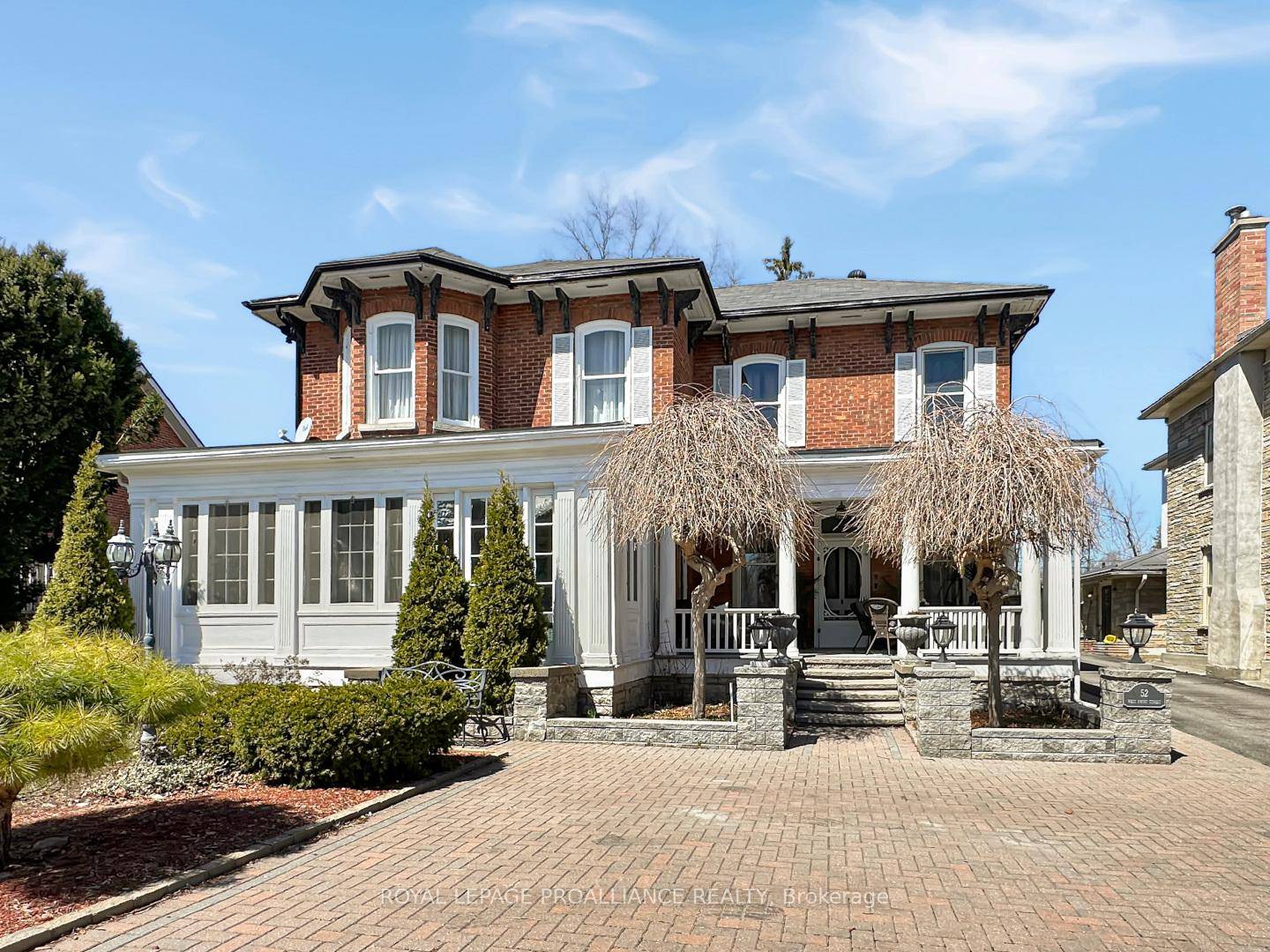 Welcome to this beautifully updated two story brick century home, nestled in the downtown community of Stirling.