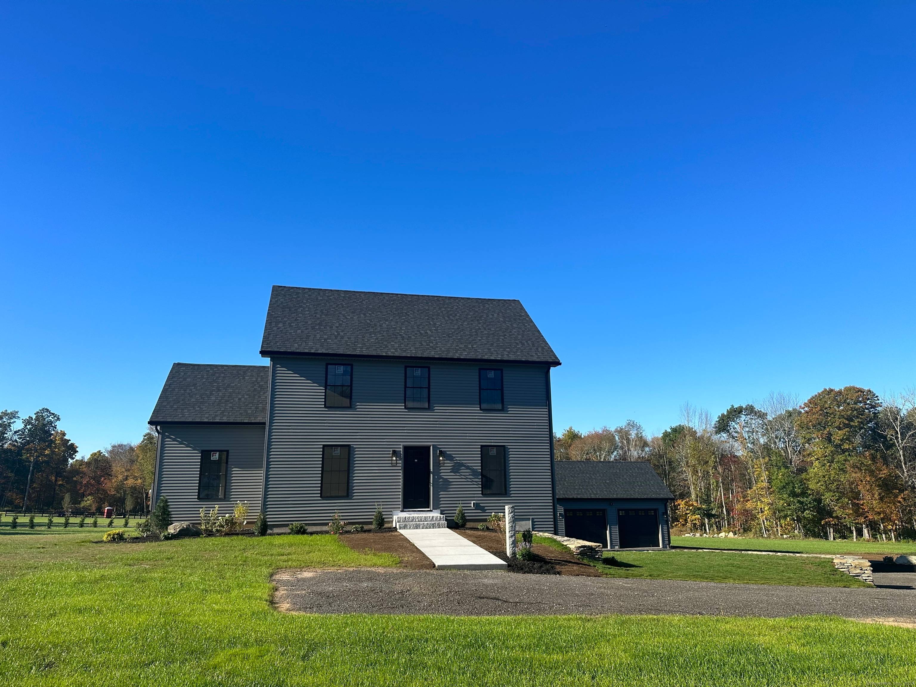 Discover your dream home in this stunning brand new 4 bedroom old school saltbox style, offering 2.