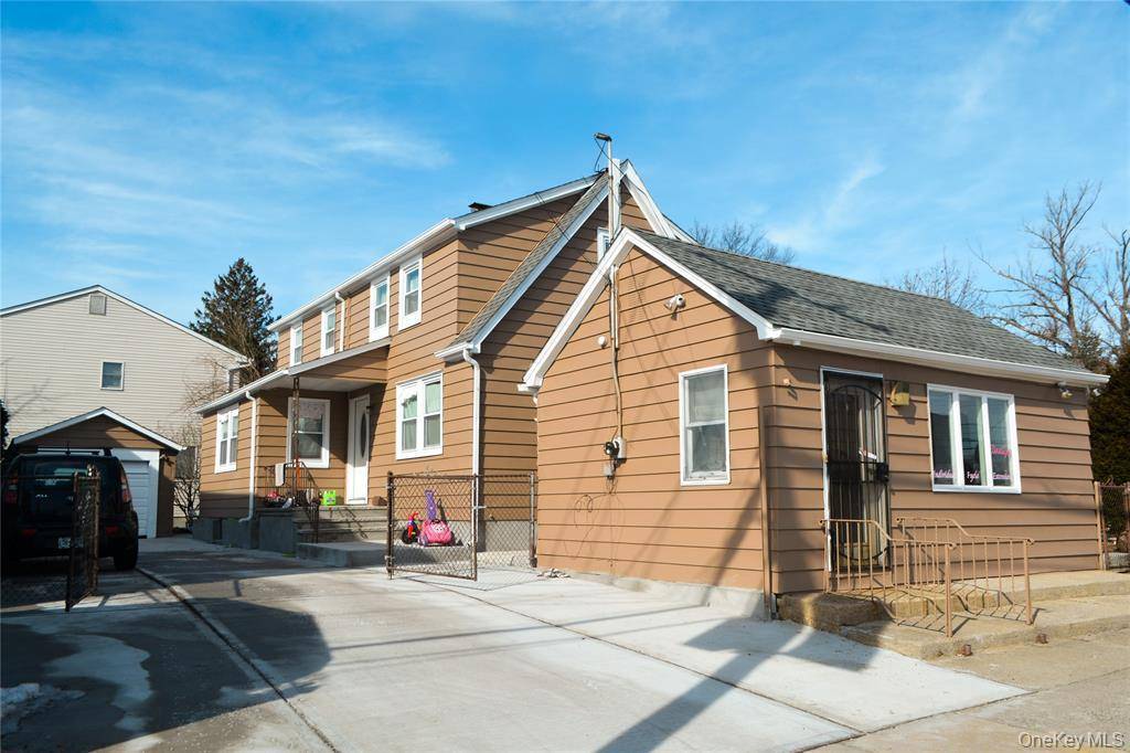 Welcome to this large, mixed use property consisting of two double lots !